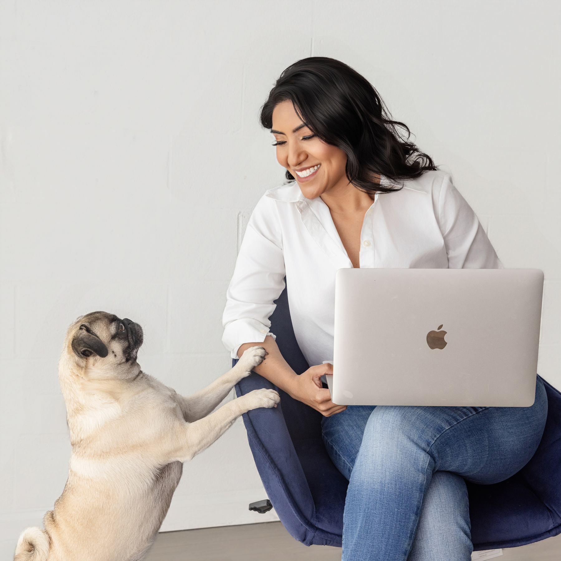 Veronica Perez, Bluebay Agency founder, working with her pug